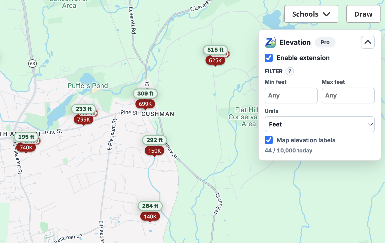 Zillow map view with elevation badges on listing pins, alongside the extension popup showing the Pro filter controls